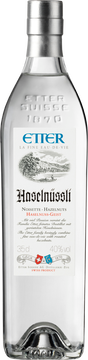 Nach der Destillation der fein gerösteten Haselnüsse reift das Destillat in 50-Liter-Korbflaschen zu einem harmonischen Ganzen. Ein von ETTER ausgeklügelter Röstgrad der Haselnüsse ergibt den einzigartigen Geschmack und eine faszinierende Genussfreude.