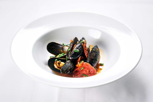 Ein »Flying Dinner«-Gang im »Magdas«: Miesmuscheln á la Buzara.
