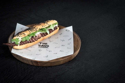 Octopussy Dawg: Sesambrötchen, Oktopus, Chipotlemayonnaise, Fenchelsalat, Koriander.