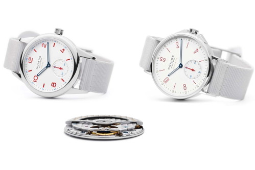 Die schicke Nomos Glashütte »Ahoi« und die Nomos Glashütte «Club neomatik» zusammen auf einem Bild. Davor das ultraflache Automatikkaliber «DUW 3001 neomatik».