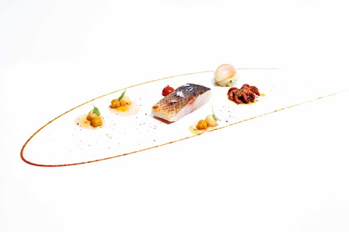 Loup de mer mit Kichererbsen.