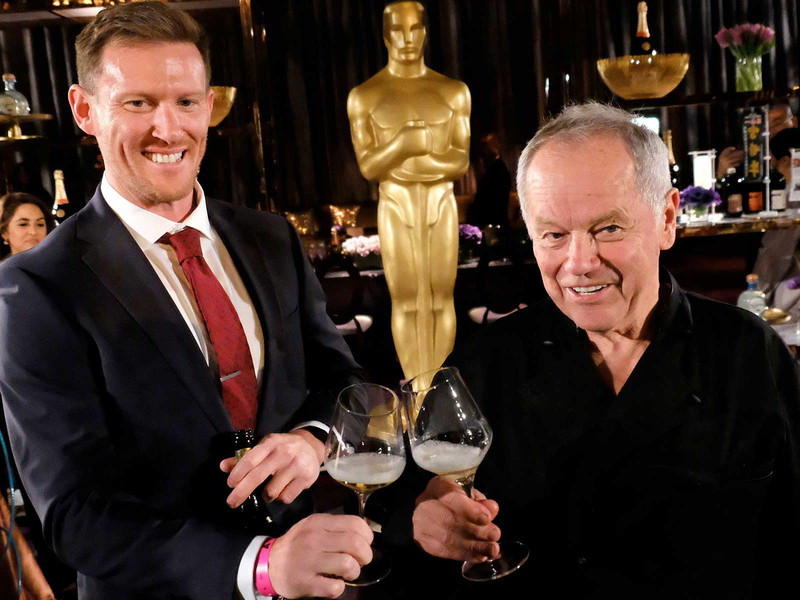 Kyle Kaplan, Brand Ambassador von Piper-Heidsiek mit Wolfgang Puck