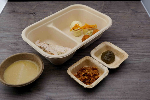 Gewinner-Gericht von Jakob Quehenberger, angerichtet in den Take-away-Boxen.