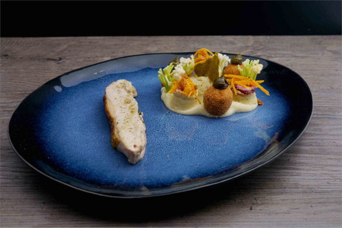 Das Gericht von Jakob Quehenberger umfasste Freilandwildhendl mit Kürbis, wildem Blumenkohl, Zitronenpfeffer und Kürbiskernöl.