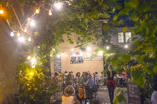 Under&nbsp;the&nbsp;arbour:&nbsp;Authentic&nbsp;Swiss cuisine&nbsp;is&nbsp;served&nbsp;in&nbsp;the&nbsp;cosy Wirtschaft Neumarkt.&nbsp;