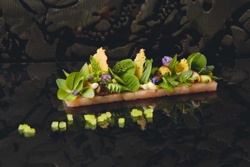 Spring&nbsp;on&nbsp;the&nbsp;plate:&nbsp;Rabbit&nbsp;with&nbsp;miso, tomato&nbsp;and&nbsp;fresh herbs&nbsp;–&nbsp;a&nbsp;meticulously prepared&nbsp;dish&nbsp;from&nbsp;The&nbsp;Restaurant&nbsp;in&nbsp;the Hotel Dolder&nbsp;Grand.