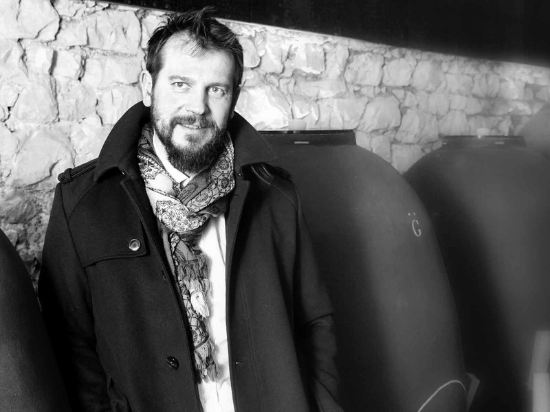 Henri Giraud's cellar master Sébastien Le Golvet in front of the amphorae used for rosé vinification.