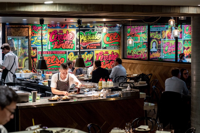 Diners enjoy punchy décor and an open kitchen in Melbourne’s Pastuso.