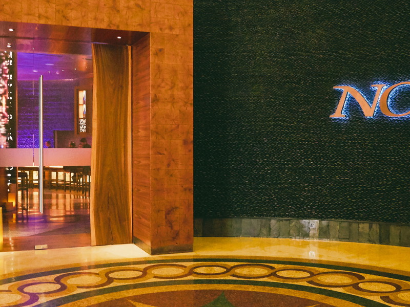 Nobu is known for its fusion cuisine blending Japanese dishes with Peruvian ingredients.