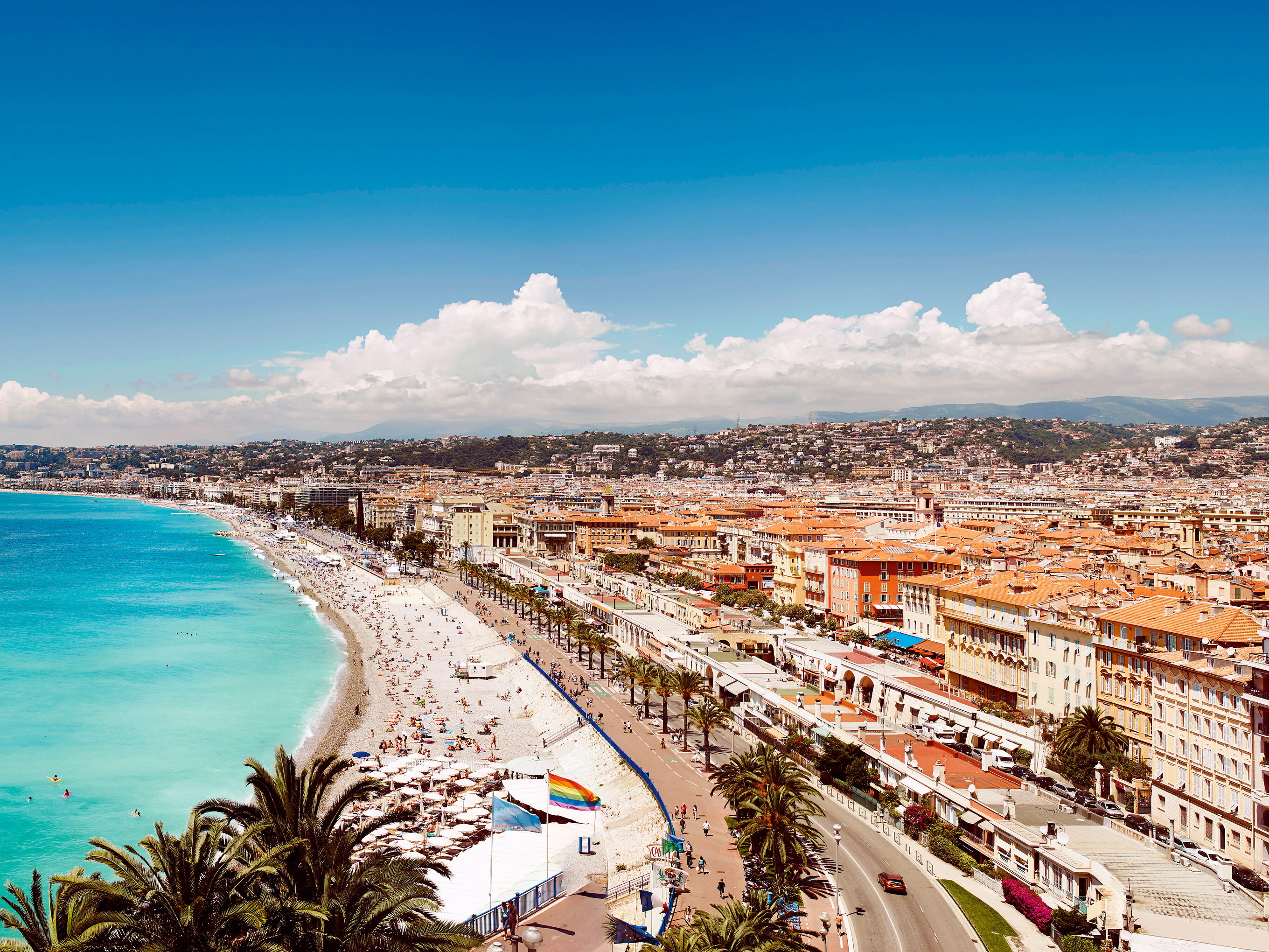 The beach stretches for kilometres under the Promenade des Anglais, where top restaurants and luxury hotels are lined up side by side.