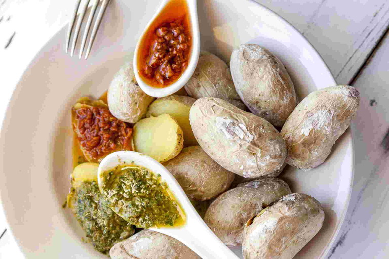 Papas arrugadas with green and red mojo