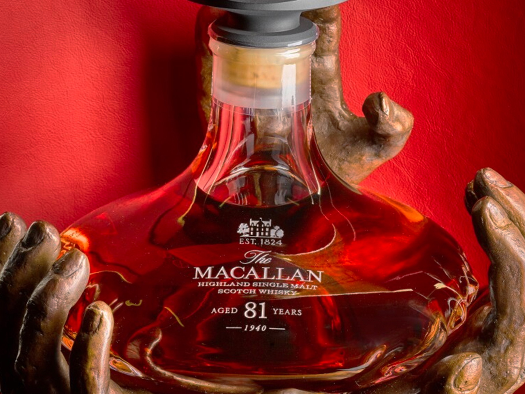 The bottle is encased in a mouth-blown decanter.