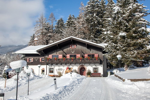 The Erlhof hotel serves alpine delicacies, and from the sun terrace you can look straight onto Lake Zell.