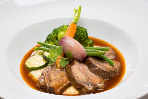 The Erlhof hotel serves alpine delicacies, and from the sun terrace you can look straight onto Lake Zell.