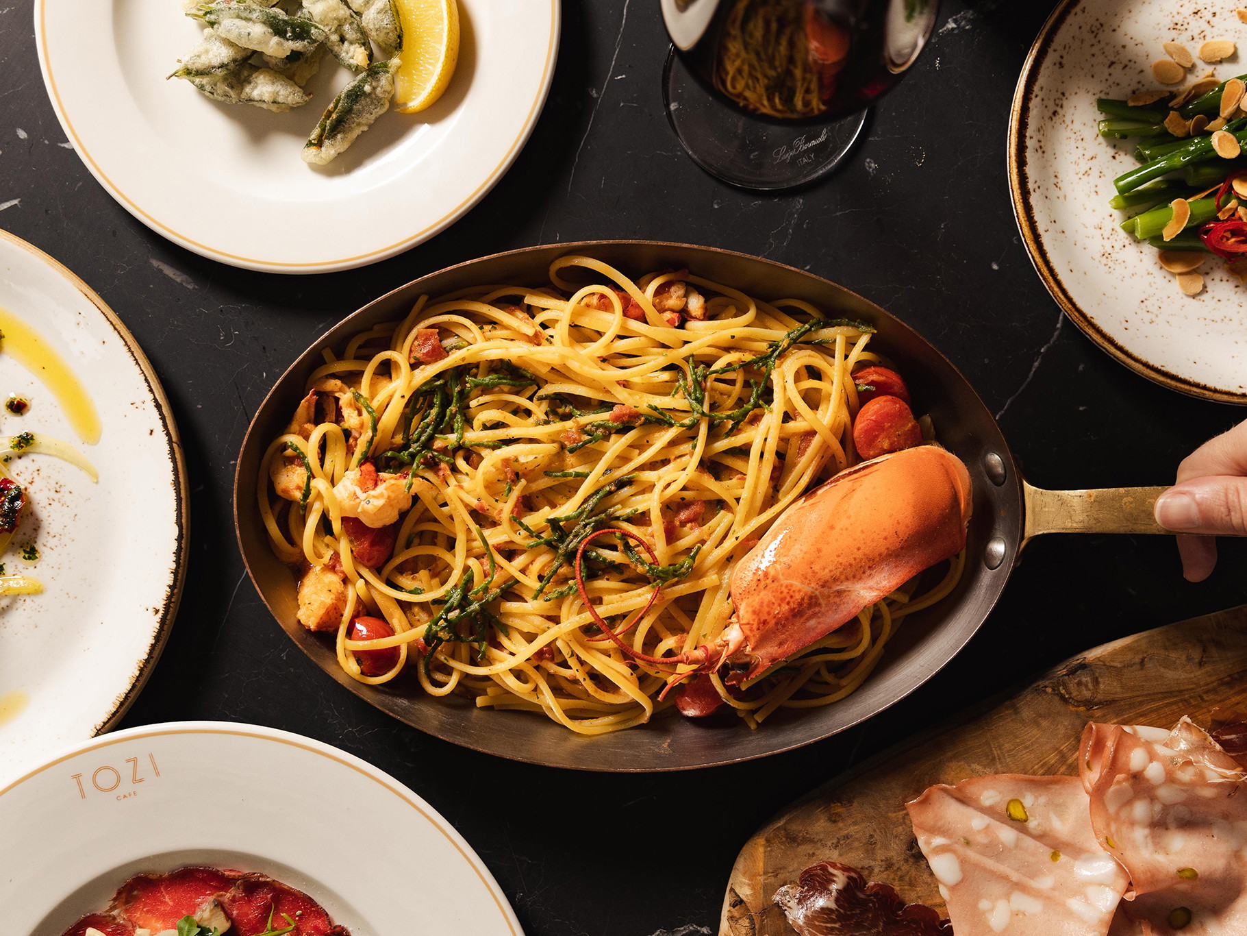 Lobster linguine is a favourite at Tozi restaurants.