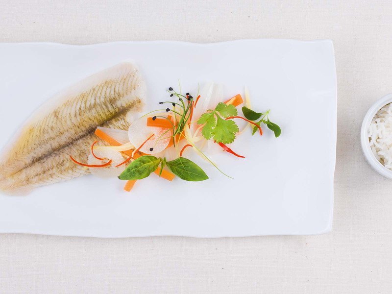 Mit südostasiatischen Aromen gedämpfte Maischolle.