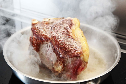 T-bone steak with fennel and asparagus salad.