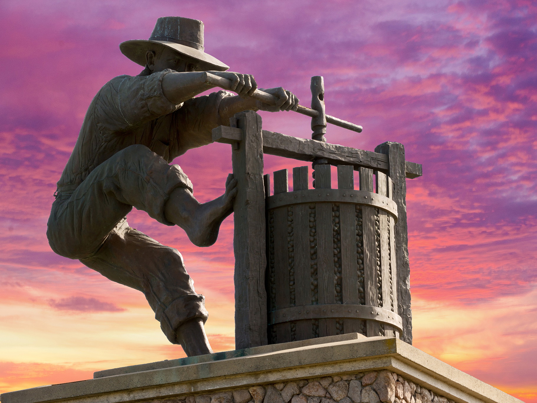 Famous Napa Valley grape crusher statue: The most important tool the wine industry possesses is unity.