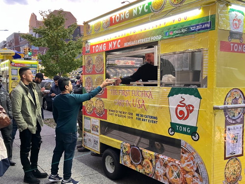 Tim Mälzer (r.) in New York City.