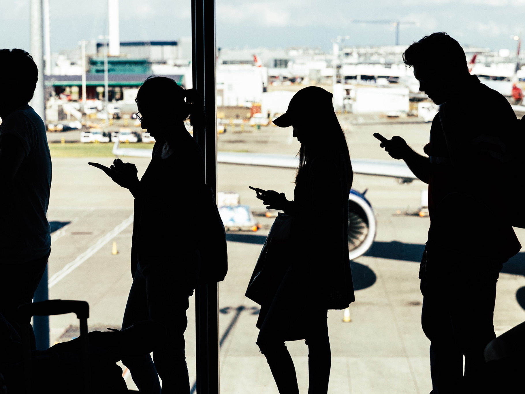 Passengers waiting to board plane at LHR