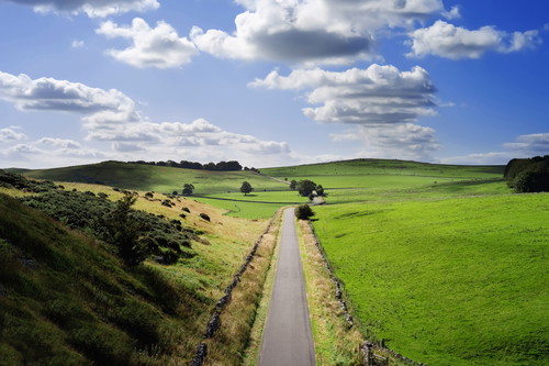 Cycleway and footpath along disused railway line at Peak District National Park