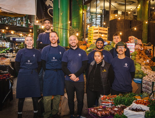 Turnips: market team with Charlie Foster in the middle.