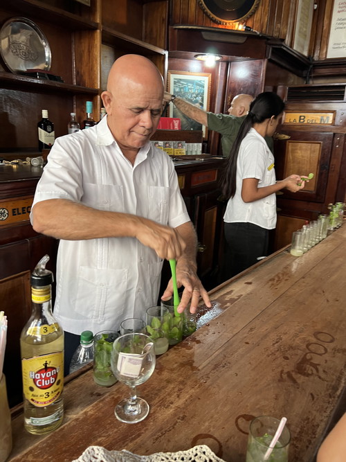 Preparing Mojitos at La Bodeguita del Medio in Havana.