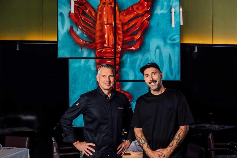 Starchef Heiko Nieder mit dem Schweizer Street Art Künstler Boogie.