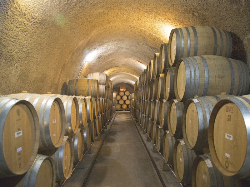 NAPA VALLEY, CA - APRIL 15: The cellars of Newton Winery in Napa Valley on April 15, 2014. Newton Vineyard is a wine estate in the Napa Valley of California famous for its Newton Unfiltered Chardonnay