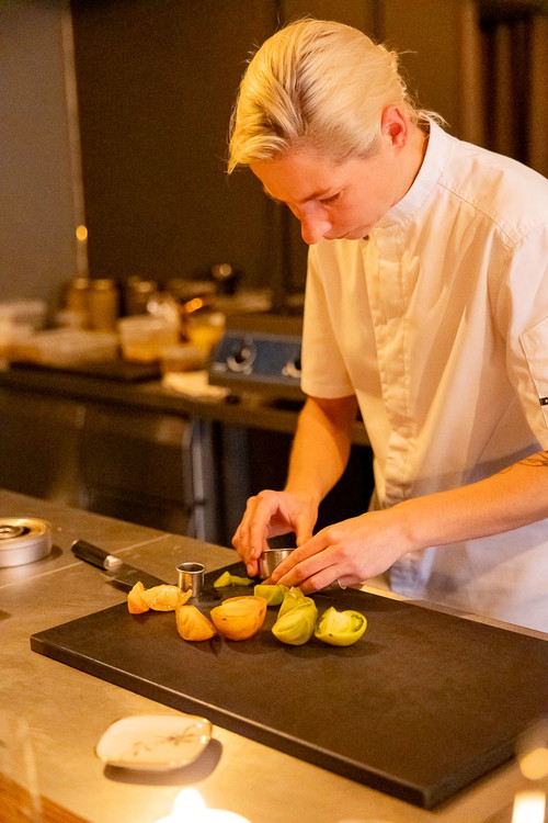 Chef of restaurant Pas Mus Vita Bartininkaitė  prepares fermented tomatoes.