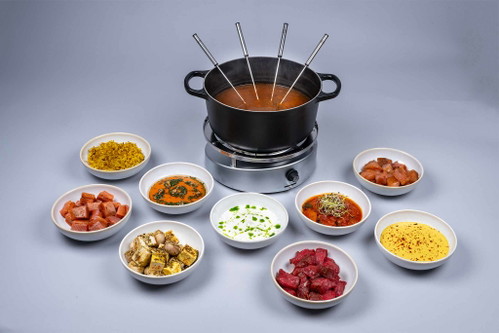Fondues Ahlan Habibi by Moses.