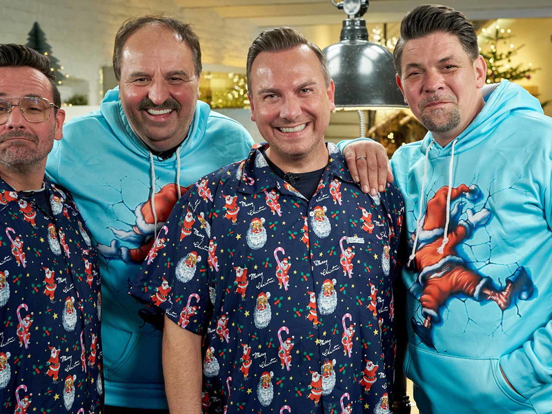 Hans Neuner mit Johann Lafer, Tim Raue und Tim Mälzer.