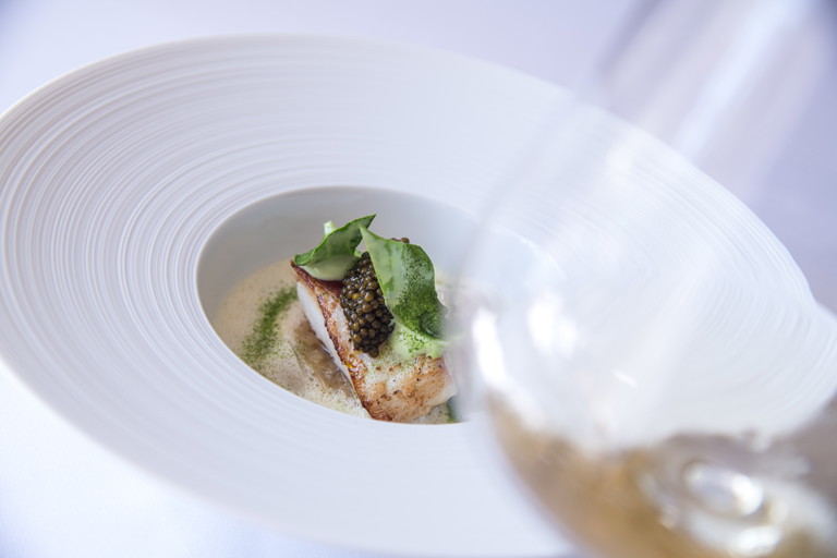 Bretonischer Steinbutt mit Champagnerkraut und Beurre Blanc.