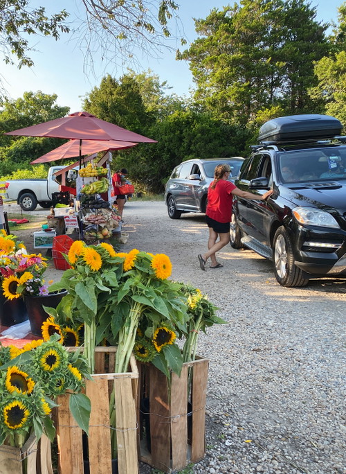 Very American: At some farm stands 
you don't even have to get out of the car out of the car - they offer a drive-in service. 