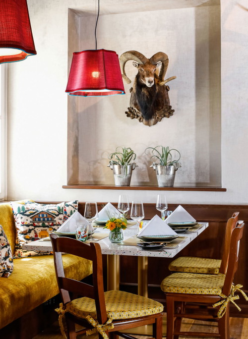 Alpine style. This is where rustic elements meet design, deer antlers meet art.