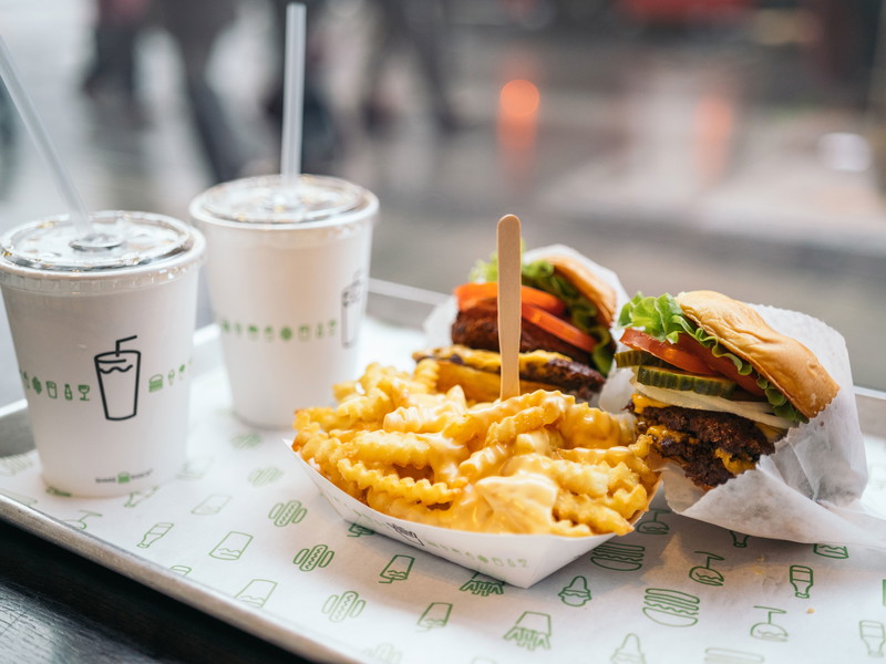 The fast-casual chain's burgers will soon delight passengers.