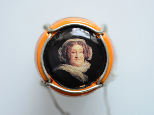 Auf der Agraffe vom Veuve Clicquot-Champagner ist die Witwe Barbe-Nicole verewigt.