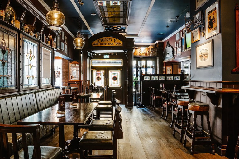 Vienna's Trinity pub is textbook: with lots of dark wood paneling and three bars.  