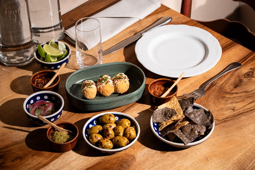 Croquetas Oaxaca with Oaxaca cheese, jalapeño, aioli and Gordal Aceitunas with Gordal olives, Ancho Chile and garlic