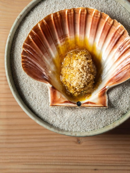 Scallop Baked in Lactic Pumpkin Seed Butter | Shaved Hazelnuts | Preserved Japanese Quince