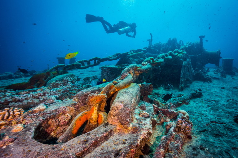 A diver hovering above the Thistlegorm wreck