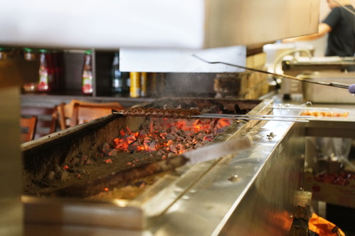 Meat grilled over fire at Ugruzina