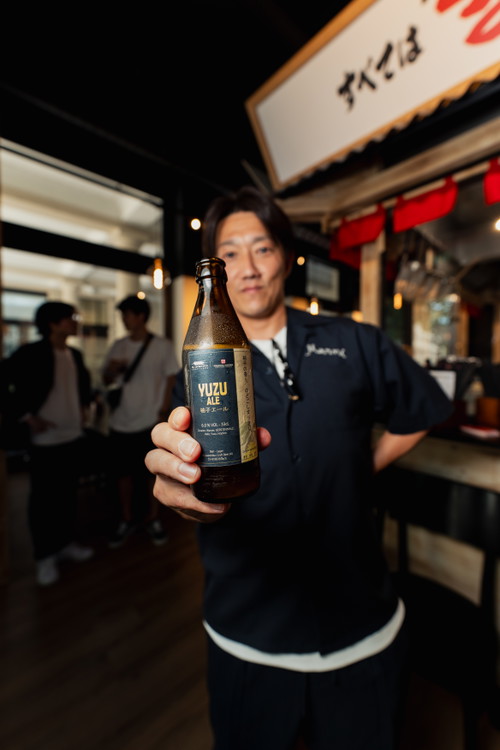 Sasajima mit einem Yuzu Ale der Brauerei St. Laurentius Craft Beer