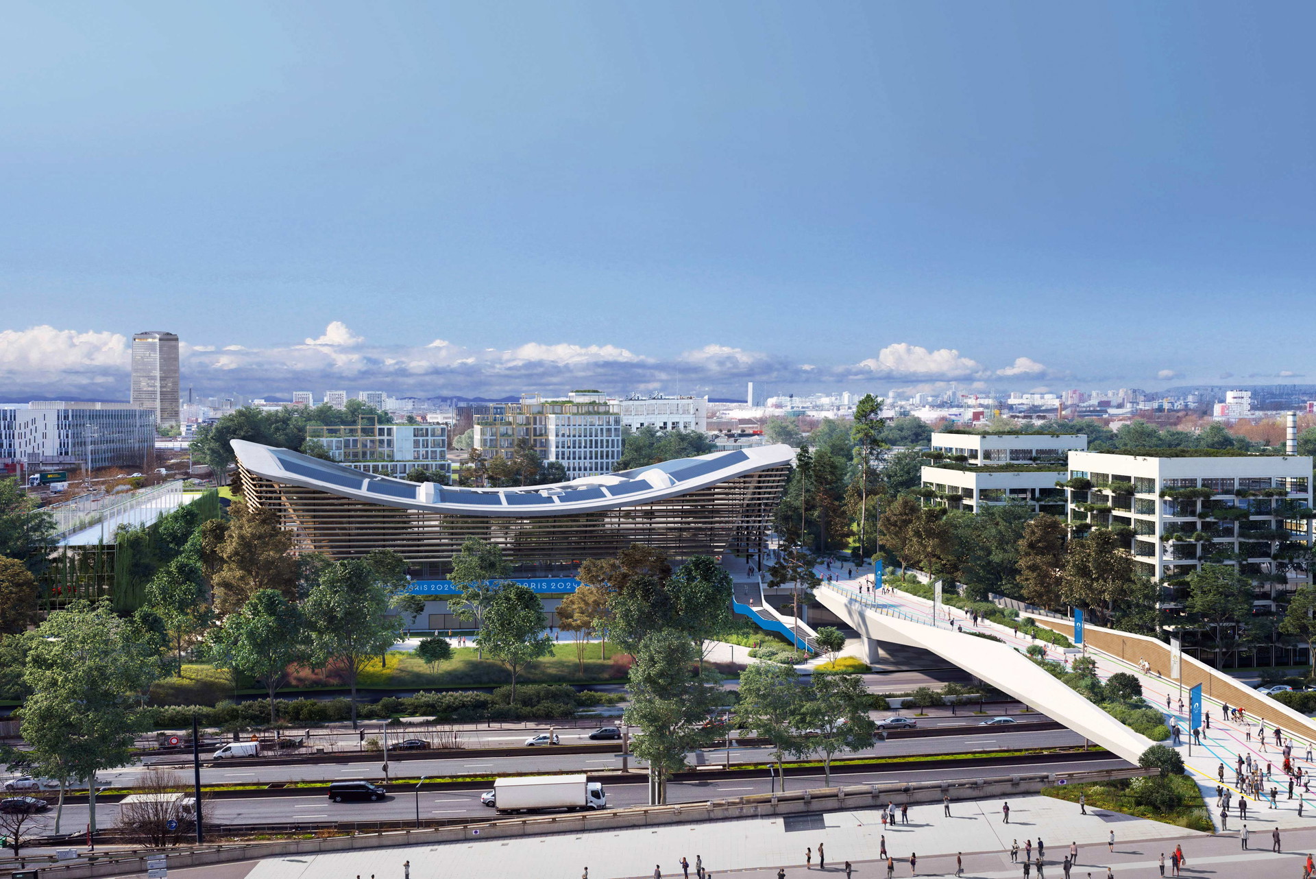 Schwungvoll schwimmen. Das Centre Aquatique, der einzige große Neubau der Spiele, wurde als Holzbau mit Photovoltaik-Dach erbaut.