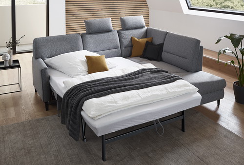 Das große Geheimnis ist die Bettissimo-Doppelbettfunktion, die dieses simple Wohnzimmermöbelstück im Nu in ein vollwertiges Bett für hohe Komfortansprüche verwandelt. 