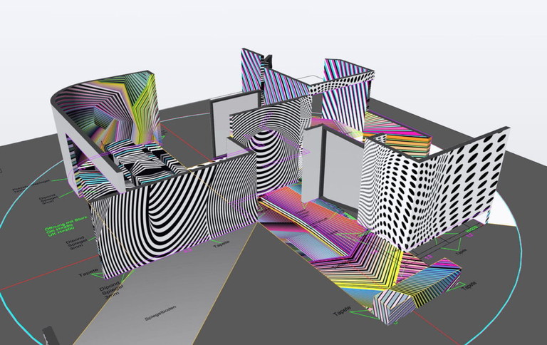 Tarnen und täuschen.
Ein Rendering des Bühnenbilds von Tobias Rehberger. Sofort zu erkennen: die für die Arbeit des Künstlers typischen Tarnmuster, auch „Dazzle Painting“ genannt.